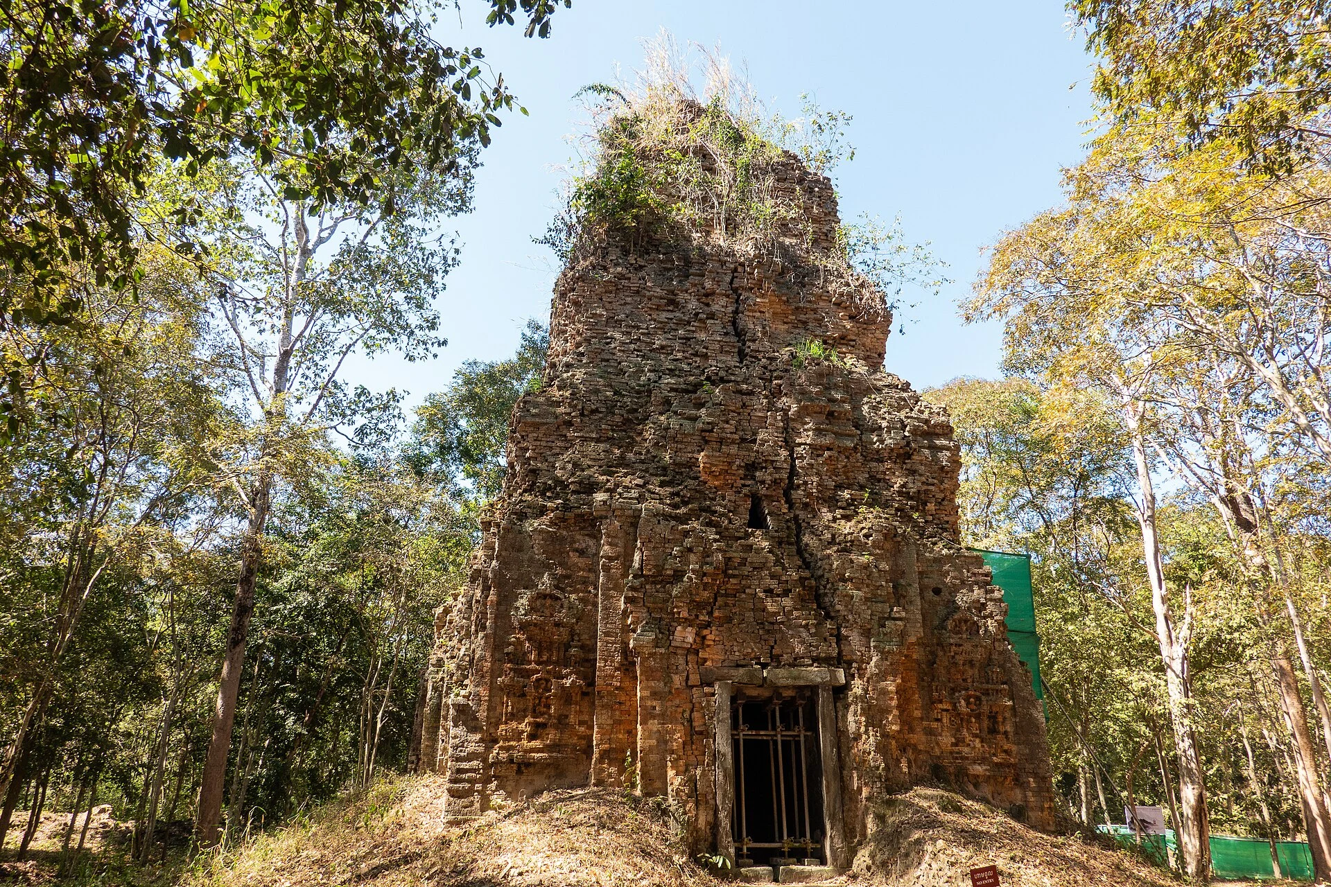 Path beside brick ruins in the archaeological landscape of Sambor Prei Kuk.